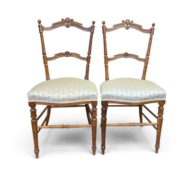 pair of antique chairs with upholstered back and upholstered seat