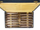 a box with a bunch of knives inside of it
