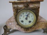 a clock that is sitting on top of a table