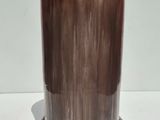 a vase that is sitting on a white table