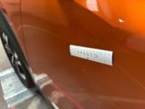 a close up of a car with a sticker on it