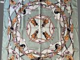 an image of a square scarf with horses on it