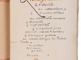 an old book with writing on it that is open