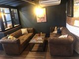 a living room with two couches and a coffee table
