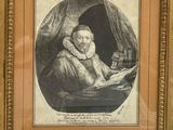 portrait of an old man reading a book and drinking a glass of wine