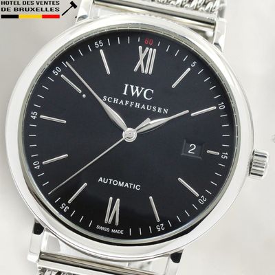 an image of a close up of a wrist watch with roman numerals