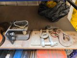 a shelf with various tools on it in a garage