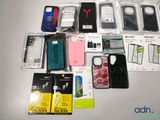many cell phones that are sitting on a table