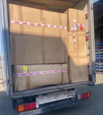 a truck that has a lot of boxes in the back