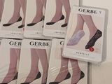 six pairs of gerbe socks are sitting on a table