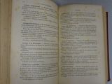 an open book that is sitting on a table