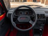 a dashboard of a car with a steering wheel and dash board