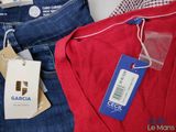 a close up of a pair of jeans with a price tag on them