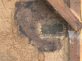 a close up of a painting of a man with a hat on