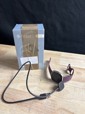 a box with a pair of glasses and a pair of headphones on it