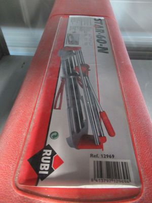 a red box with a bunch of tools inside of it