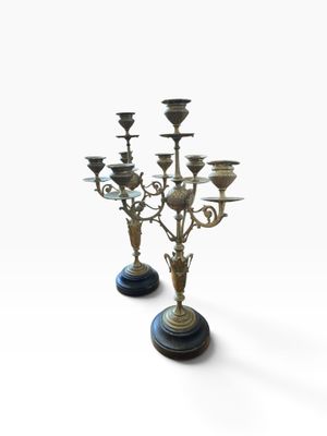 pair of antique brass candelabs on marble bases