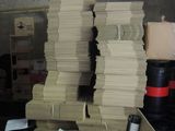 many stacks of papers stacked on top of each other