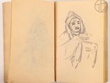 someone is drawing a picture of a woman on a book