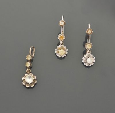 Demi parure en or gris 18K 750 millièmes, comprenant une pai…