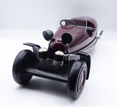 a toy car that is sitting on top of a table