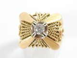 an image of a gold ring with a diamond
