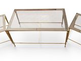 three glass and brass side tables with a glass top