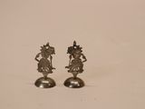 pair of silver plated figurines of a woman and a man