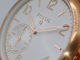 a close up of a watch on display on a table