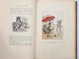 an open book with a picture of a man holding a red umbrella