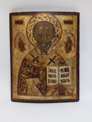 an old wooden icon of st nicholas the great