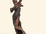 statue of a woman holding a bow and arrow on a white background