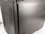 a black box that is sitting on a white surface