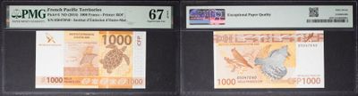 three different types of currency on display in a store window