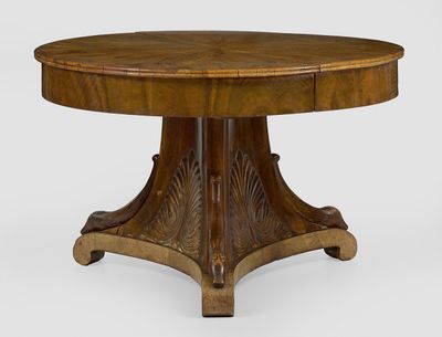a round table with a wooden top and a wooden base