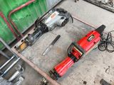 a picture of a pair of electric tools sitting on the floor