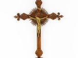 a wooden cross with a crucif on it against a white background