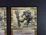 two cards that are sitting on a table