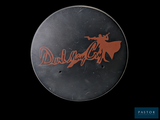 a picture of a black disc with a red logo on it