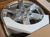 a box with a wheel inside of it that is in a box