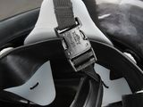 a black and white helmet with a strap on it