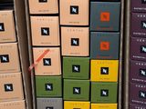 several boxes of wine are stacked on top of each other