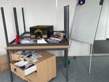 a table with a white board and a whiteboard on it