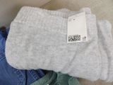 a pair of socks that are sitting on the floor