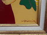 une photo d'un tableau représentant une femme avec une fleur dans les cheveux
