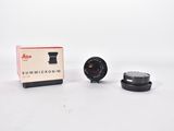 an image of a camera lens sitting on top of a box