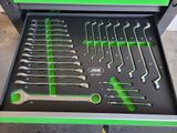 a close up of a tool box filled with wrens and wrenches