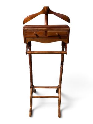 an image of a wooden stand with a coat hanger on top of it