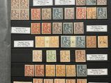 an open book with a bunch of different stamps on it