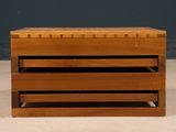 a small wooden box that is sitting on the floor